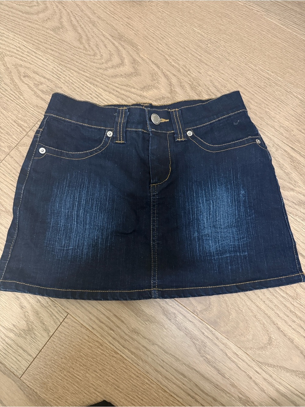 Dark wash denim mini skirt
